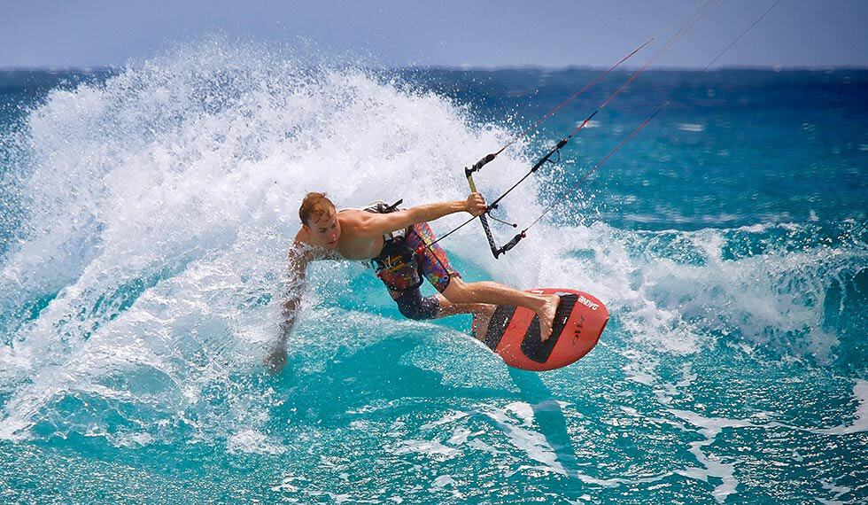 kitesurfing in waves